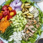 Dinner salad with salmon.